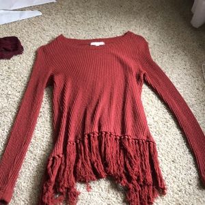 Rust sweater with fringe